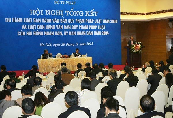 Phó Thủ tướng Nguyễn Xuân Phúc đến dự Hội nghị tổng kết thi hành luật ban hành văn bản quy phạm pháp luật. Ảnh: Phương Hoa - TTXVN