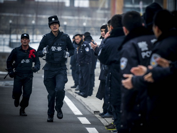 Cảnh sát đặc nhiệm Trung Quốc luyện tập tại Urumqi, thủ phủ Khu tự trị Tân Cương. (Nguồn: AFP/ TTXVN)