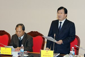 Bộ trưởng Bộ Xây dựng Trịnh Đình Dũng phát biểu tại phiên họp. (Ảnh: An Đăng/TTXVN)