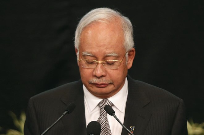 Thủ tướng Malaysia Najip Razak thông báo chiếc máy bay đã đâm xuống Nam Ấn Độ dương (Nguồn: Reuters)