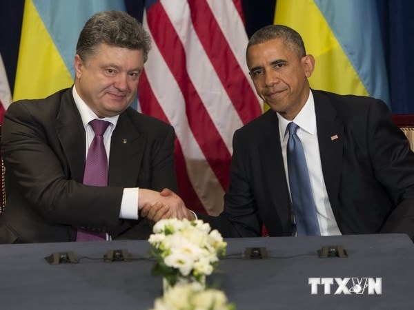 Tổng thống Mỹ Barack Obama (phải) có cuộc gặp với Tổng thống mới đắc cử Ukraine Petro Poroshenko. (Nguồn: AFP/TTXVN)