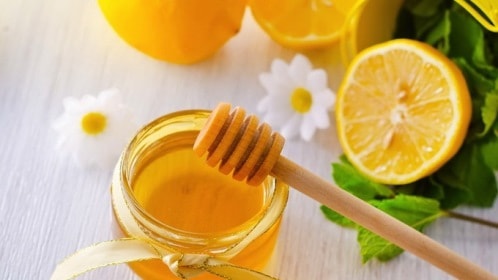 Mật ong và chanh giúp tẩy lông mặt hiệu quả