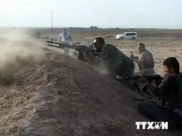 Lực lượng an ninh Iraq giao tranh với các tay súng phiến quân 