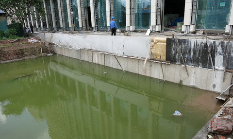 Việc xử lý các hố khảo cổ ngập nước cần được khẩn trương tiến hành tại Hoàng thành Thăng Long