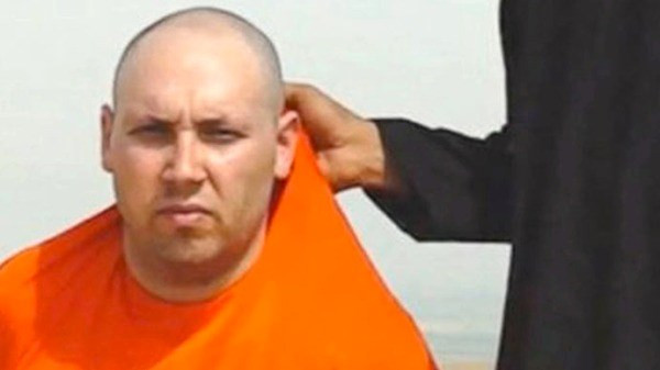 Hình ảnh nhà báo tự do 31 tuổi Steven Sotloff trong video clip. (Ảnh: rt.com)