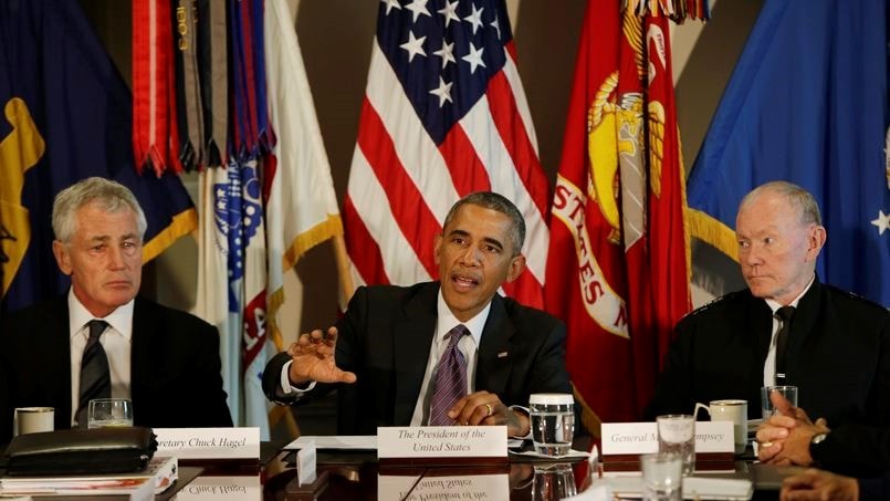 Tổng thống Barack Obama họp bàn về vấn đề tổ chức IS hôm 8 tháng 10. Ảnh: Gary Cameron