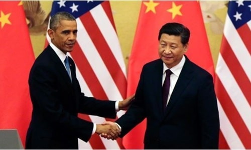 Tổng thống Mỹ Barack Obama (trái) và Chủ tịch Trung Quốc Tập Cận Bình trong buổi họp báo tổ chức tại Đại Lễ đường Nhân dân, Bắc Kinh (Trung Quốc) ngày 12/11. Ảnh AP