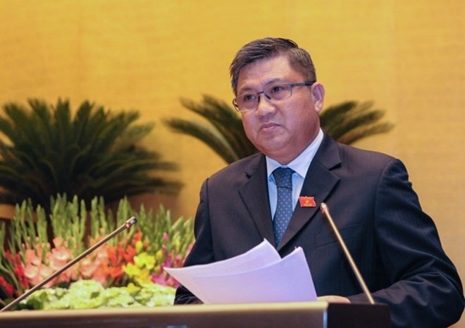 Chủ nhiệm Ủy ban Kinh tế của Quốc hội Nguyễn Văn Giàu trình bày báo cáo giải trình, tiếp thu, chỉnh lý dự án Luật Doanh nghiệp (sửa đổi) sáng 26/11