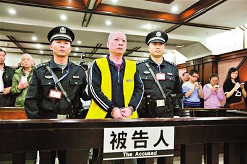 Trương Tân Hoa tại tòa án. Ảnh: CNR