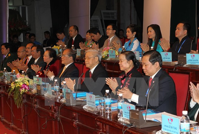 Tổng Bí thư Nguyễn Phú Trọng, Chủ tịch Quốc hội Nguyễn Sinh Hùng và các đại biểu tham gia Đoàn Chủ tịch Đại hội. Ảnh: TTXVN