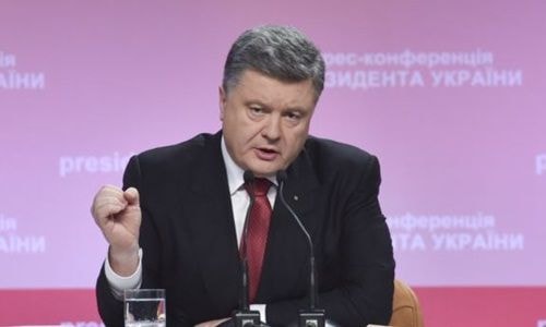 Tổng thống Petro Poroshenko phát biểu tại cuộc họp báo hôm 30/12/2014.  Nguồn: Reuters