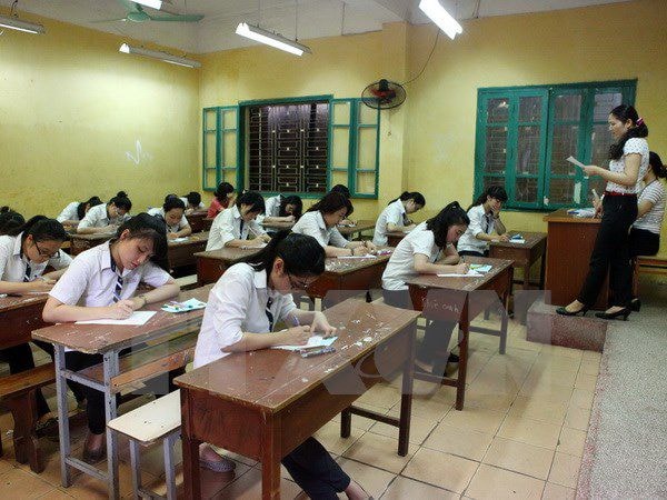 Thí sinh làm bài tại Kỳ thi tốt nghiệp Trung học phổ thông năm học 2013-2014. Ảnh: TTXVN