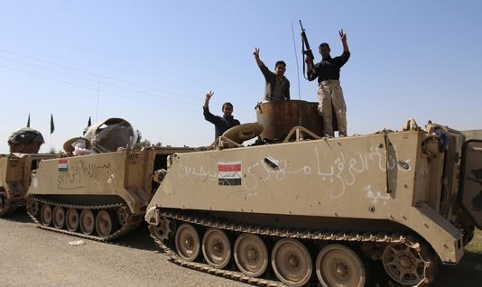 Quân đội Iraq tại phía Bắc Thủ đô Baghdad hôm 1/3.  Ảnh: Reuters /Thaier Al-Sudani