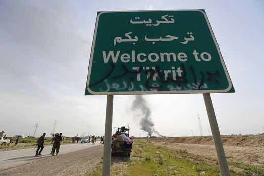  Quân đội Iraq đang từng bước tiếp cận và chiếm lại thành phố Tikrit. Ảnh: Reuters/Thaier Al-Sunani