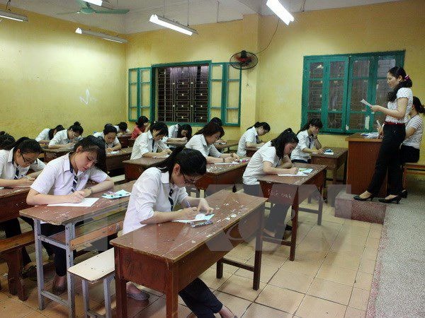 Thí sinh làm bài tại Kỳ thi tốt nghiệp THPT năm học 2013-2014. Ảnh: TTXVN
