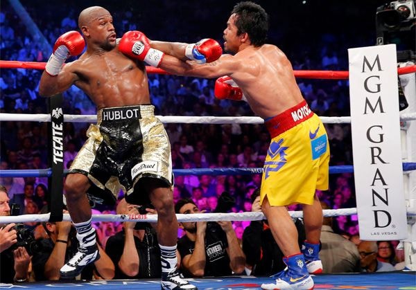 Dù rất cố gắng và thi đấu cởi mở, Pacquiao vẫn không thể gây ra bất ngờ. Ảnh: Reuters.