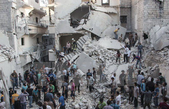  Cảnh đổ nát tại thành phố Aleppo. (Nguồn: AFP/TTXVN)