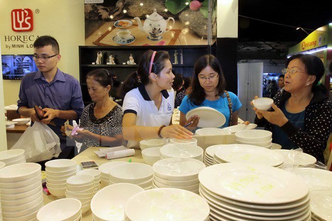 NHàng Việt Nam chất lượng cao ngày càng chinh phục được nhiều người tiêu dùng. (Ảnh: Thanh Vũ/TTXVN)