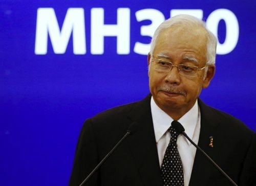 Thủ tướng Malaysia Najib Razak xác nhận phần cánh phụ trôi dạt vào bờ hòn đảo Reunion là của máy bay MH370. Ảnh: The Malay Mail Online
