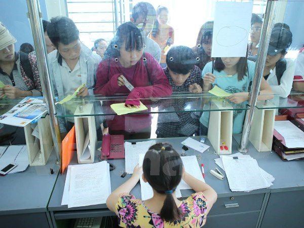   Thí sinh tham gia xét tuyển đại học năm 2015. (Ảnh: Lê Minh Sơn/Vietnam+)