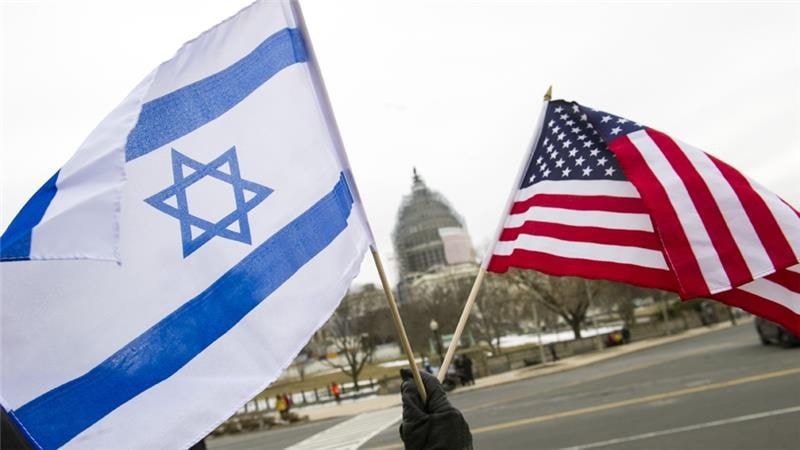 Người biểu tình ủng hộ Israel vẫy cờ phía trước Đồi Capitol ở Washington vào tháng 3/2015, khi Thủ tướng Benjamin Netanyahu có bài phát biểu trước Quốc hội Mỹ. (Nguồn: AP)