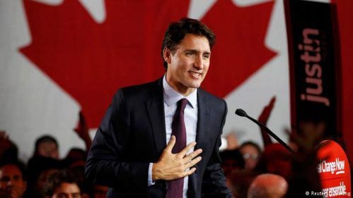 Thủ tướng Justin Trudeau tuân thủ cam kết tiếp nhận 25.000 người di cư từ Syria tới Canada trong năm nay. Ảnh: Reuters.