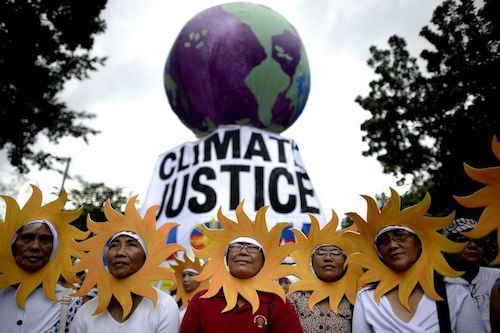 Khoảng 3.000 người dân Manilla, Philippines xuống đường hôm 28/11. Ảnh: AFP