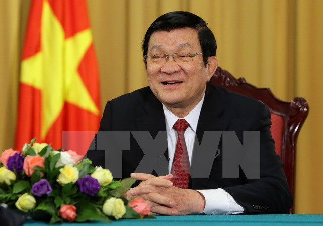 Chủ tịch nước Trương Tấn Sang trả lời phỏng vấn của phóng viên các cơ quan Thông tấn, báo chí Việt Nam. (Ảnh: Nguyễn Khang/TTXVN)