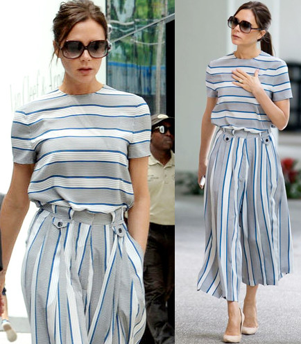 Victoria Beckham dạo phố ở Miami trong thiết kế gồm áo kẻ ngang và quần culottes sọc dọc. Ngọc Trinh chia sẻ bức ảnh này và nói cô copy mẫu trang phục này cho đồ của mình.