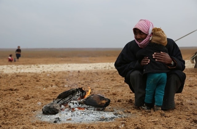 Người di cư Syria hiện đang trong tình cảnh thiếu thốn trăm bề. Ảnh: AFP.