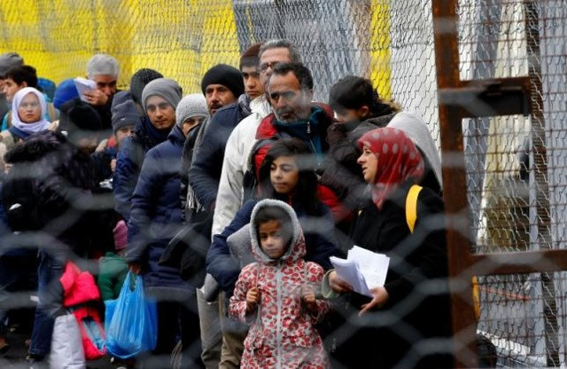 Người nhập cư ở biên giới Slovenia. Ảnh: Reuter. 