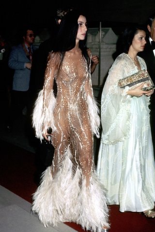 Cher, in Bob Mackie, at the opening of the Met's Romantic and Glamorous Hollywood Design, 1974.