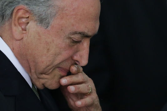 Thách thức lớn đang chờ đợi Tổng thống lâm thời Brazil Michel Temer. Ảnh: AP.