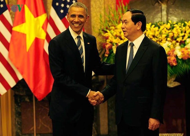 Sau lễ đón, Chủ tịch nước Trần Đại Quang và Tổng thống Obama chụp ảnh kỷ niệm. (Ảnh: Ngọc Thành)