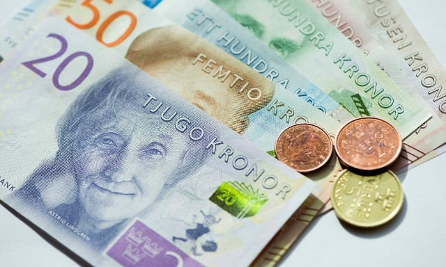 Tiền giấy và tiền xu ở Thụy Điển đã dần rơi vào quên lãng. Ảnh: Guardian.