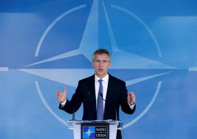 Tổng thư ký NATO Jenss Stoltenberg phát biểu trước truyền thông trong cuộc họp với bộ trưởng quốc phòng NATO tại trụ sở Brussels, Bỉ. 