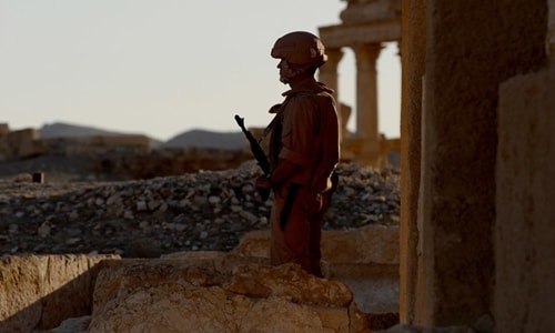 File Photo: Russian army soldiers patrol the ancient Syrian city of Palmyra on May 5, 2016 © Vasily Maximov / AFP