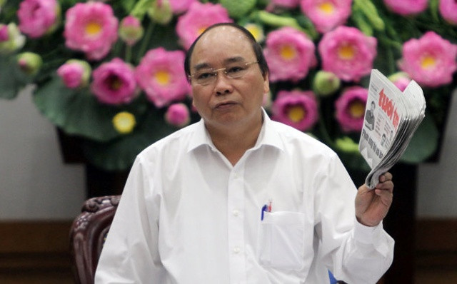 Thủ tướng Nguyễn Xuân Phúc tại cuộc họp của Thường trực Chính phủ về thi hành Luật Doanh nghiệp, Luật Đầu tư. Ảnh TTO