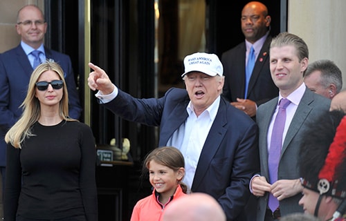 [Caption]Republican presidential candidate Donald Trump, his son Eric (R) and his daughter Ivanka (L) arrive at his Turnberry golf course, in Turnberry, Scotland, Britain June 24, 2016. REUTERS/Clodagh Kilcoyne