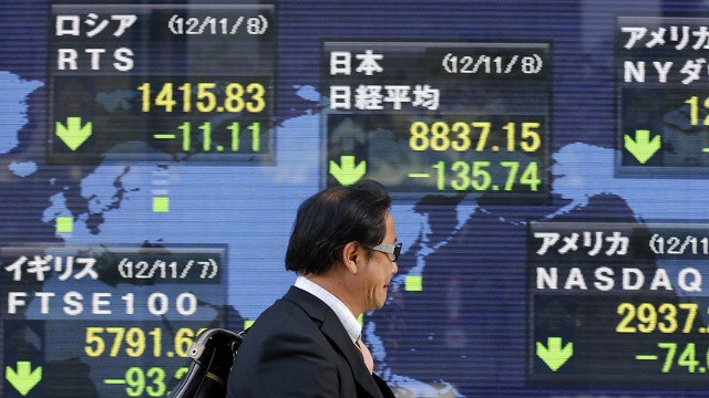 Đồng yen mạnh là một trở ngại đối với Abenomics, cũng như sự phục hồi của kinh tế Nhật Bản. Ảnh: NPR.