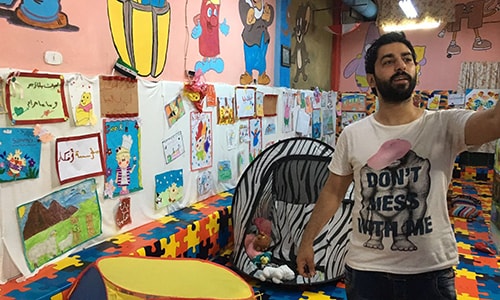 [Caption]Asmar Halabi, the orphanages director.