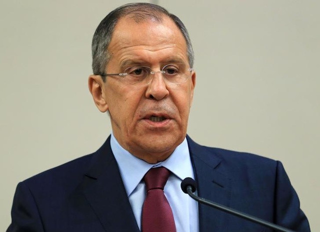 Ngoại trưởng Nga Sergei Lavrov tham dự một buổi họp báo sau cuộc gặp với người đồng cấp Mỹ John Kerry tại Geneva, Thụy Sĩ ngày 26/8. Ảnh: Reuters.