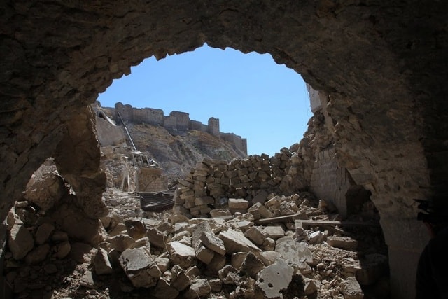 Quân đội Syria giành quyền kiểm soát quận Farafira từ tay lực lượng phiến loạn sau nhiều ngày không kích ác liệt. Ảnh: AFP