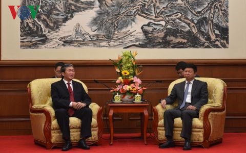 Đồng chí Đinh Thế Huynh hội kiến Trưởng ban Liên lạc Đối ngoại Trung ương Đảng Cộng sản Trung Quốc Đào Tống.
