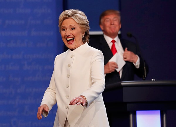 Biểu cảm của Clinton và Trump sau cuộc tranh luận lần 3. Ảnh: Internet.