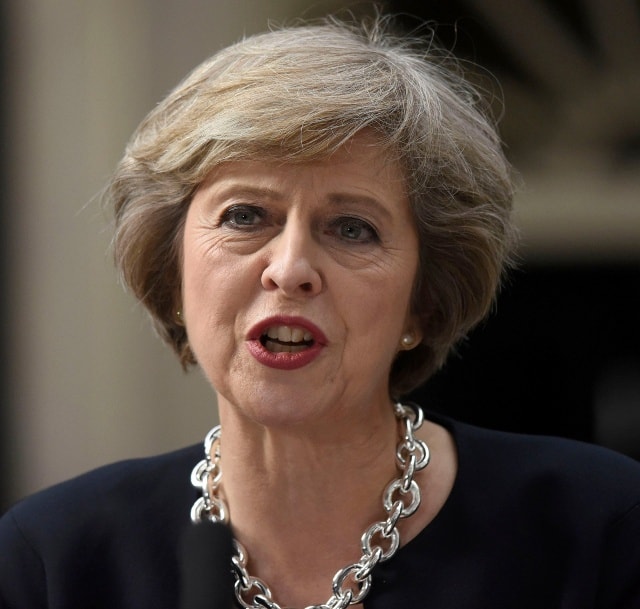 Thủ tướng Anh Theresa May có quan điểm cứng rắn đối với người di cư ở Calais. Ảnh: PA.