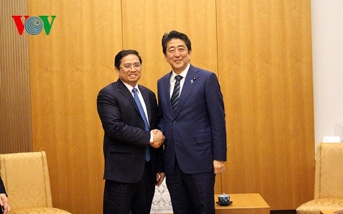 thu tuong nhat ban abe tiep dong chi pham minh chinh hinh 1