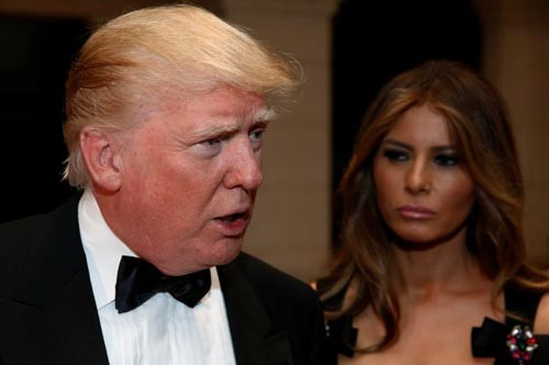 Tổng thống Mỹ đắc cử Donald Trump và phu nhân tại câu lạc bộ Mar-a-lago ở Palm Beach, bang Florida đêm giao thừa 31-12-2016 Ảnh: REUTERS