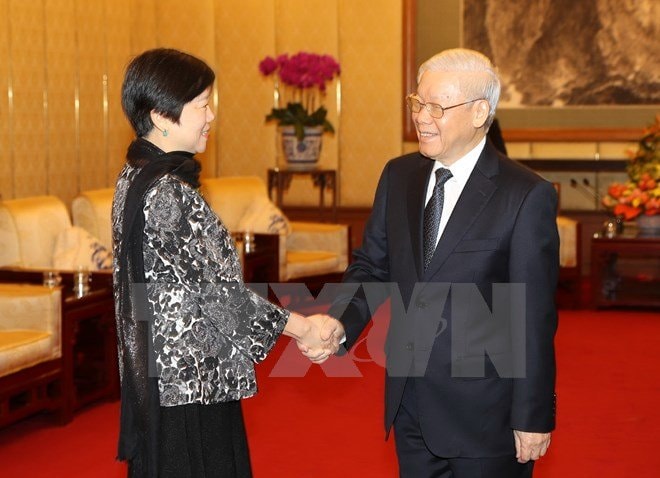 Tổng Bí thư tiếp bà Lý Tiểu Lâm, Chủ tịch Hội Hữu nghị Đối ngoại nhân dân TQ. (Ảnh: TTXVN).