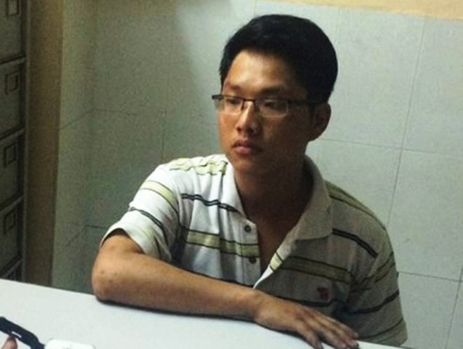 Minh tại cơ quan công an.